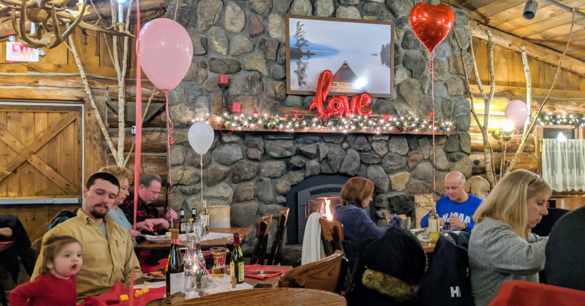 people dining at the log jam restaurant in lake george on valentine's day