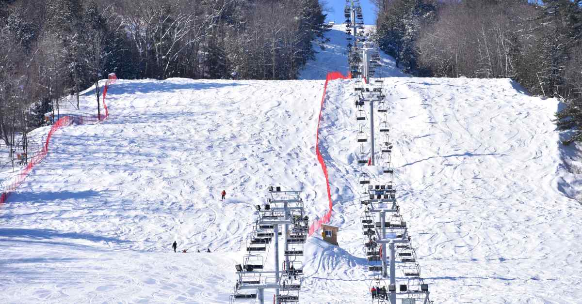 view of a chairlift and ski slopes