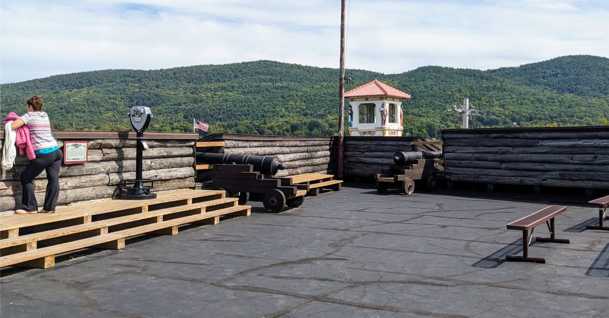 woman at top of fort william henry museum looking out at view