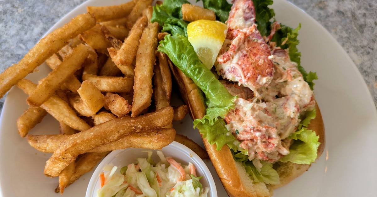 lobster roll with fries and coleslaw