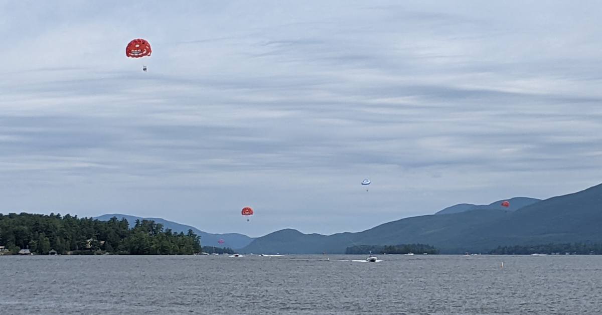 parasailers on lake