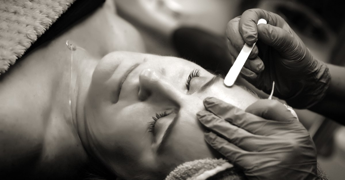 women getting eyebrow waxing