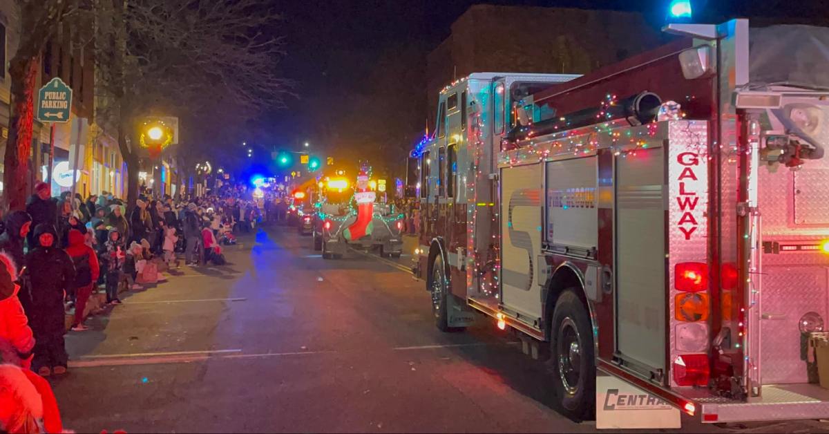 fire trucks in a holiday parade