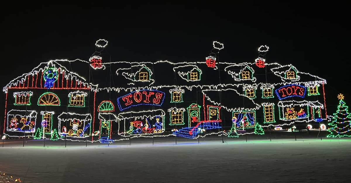 a large holiday lights display in the shape of a house