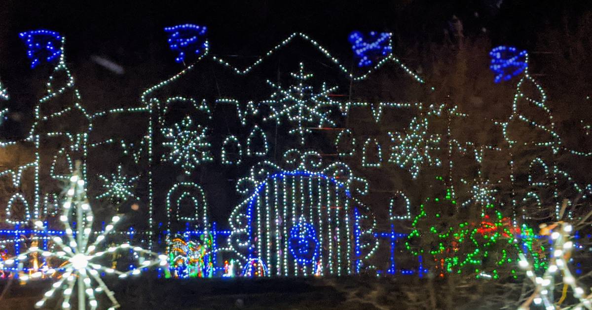 a holiday light display in the shape of castle gate