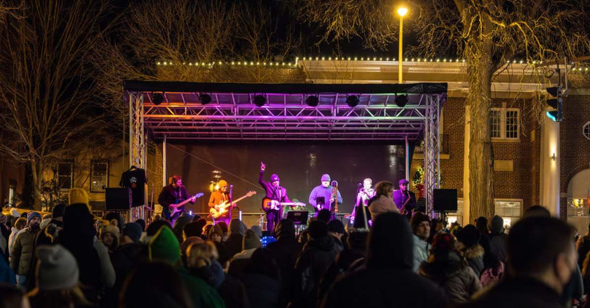 concert on a stage outdoors at night