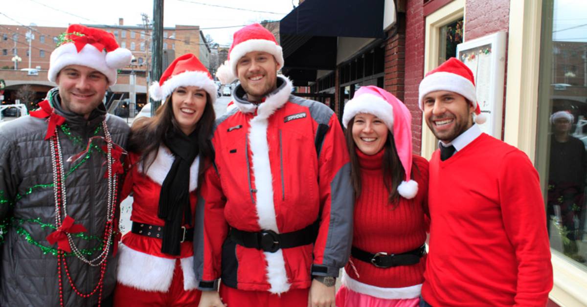 people dressed up for a SantaCon