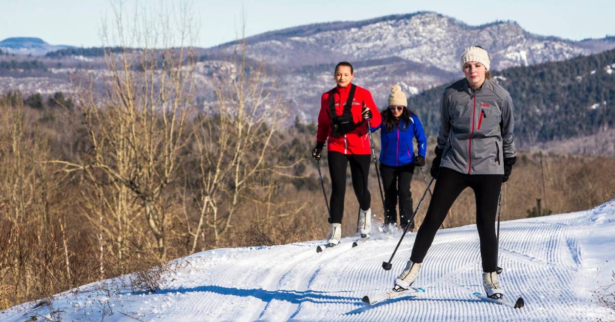 three cross-country skiers