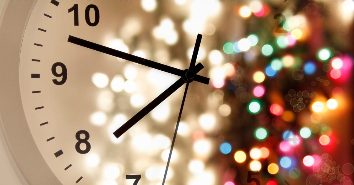 clock image blending with Christmas lights