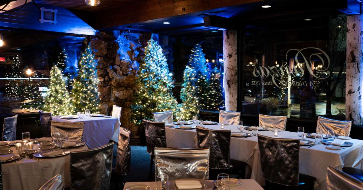 restaurant dining room decorated with Christmas trees