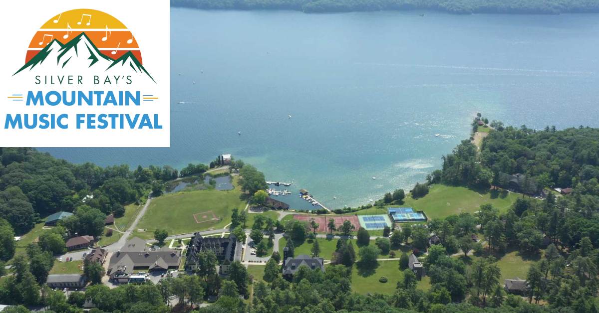 aerial image of Silver Bay YMCA with logo for mountain music festival in the upper left corner