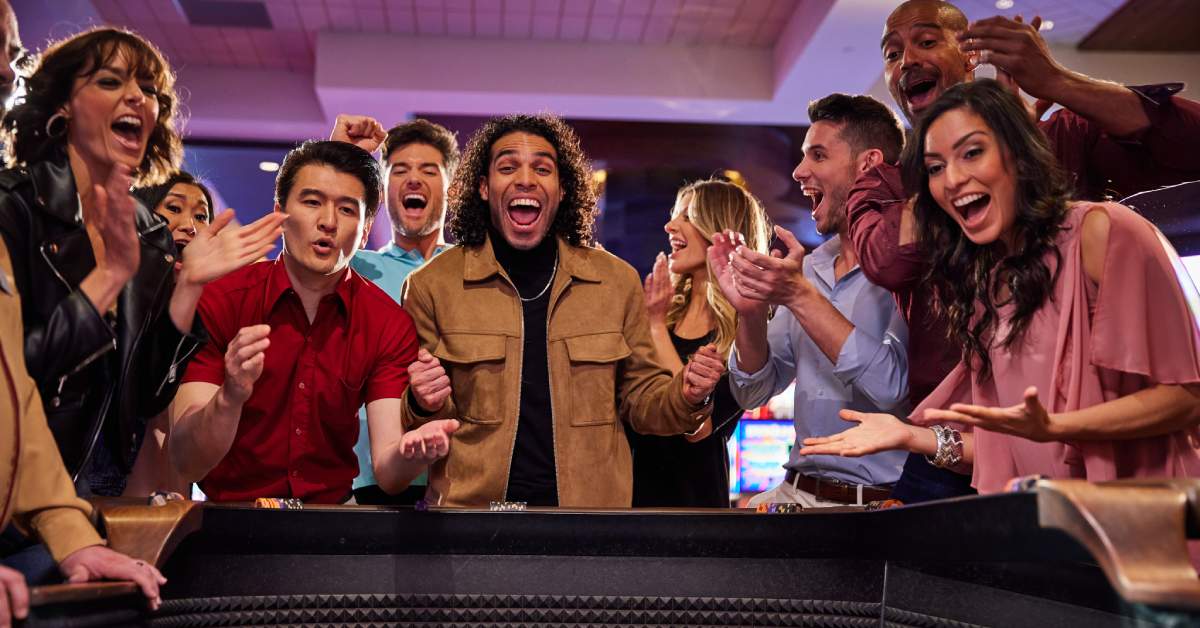 group of people at a craps table