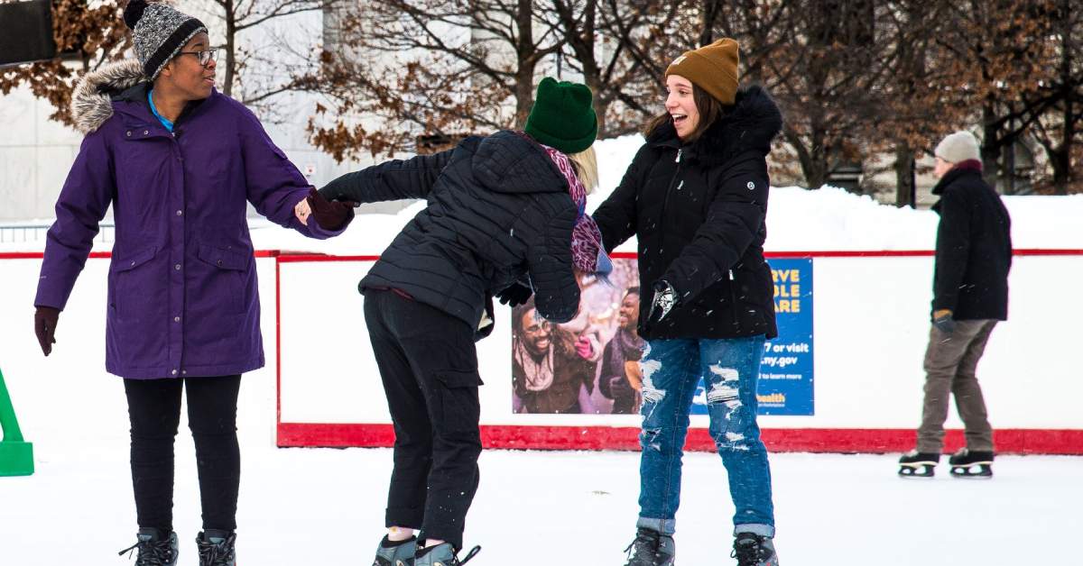 four ice skaters