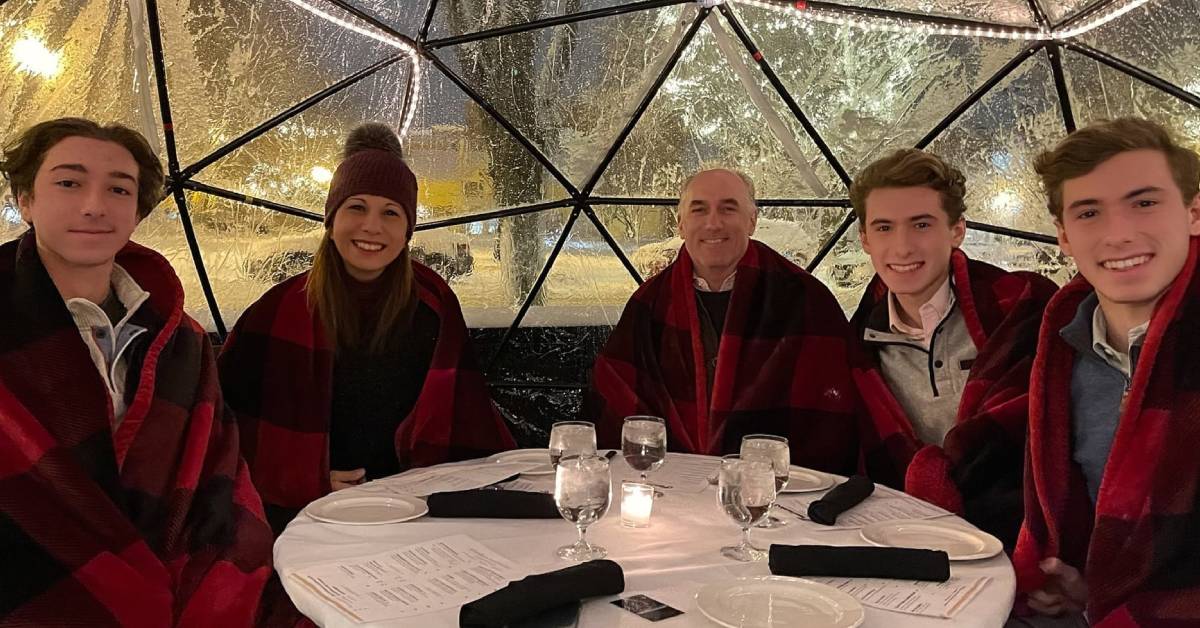 family of five in dining igloo