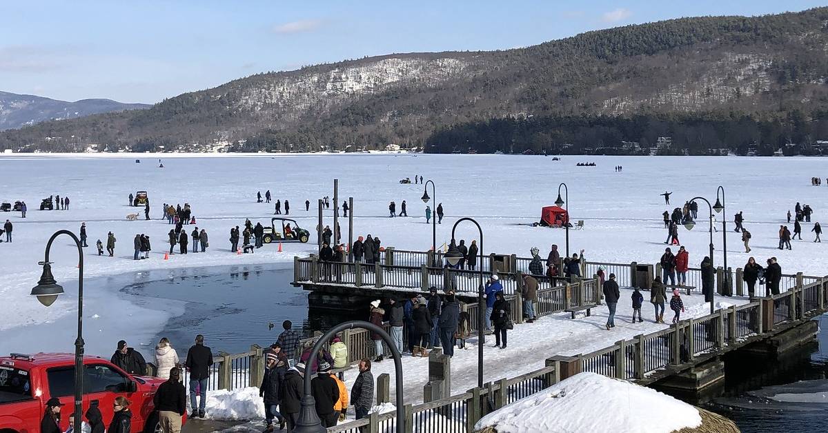 people on frozen lake in lake george in winter during winter carnival