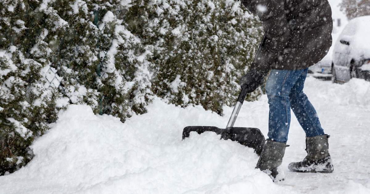 a person shoveling snow