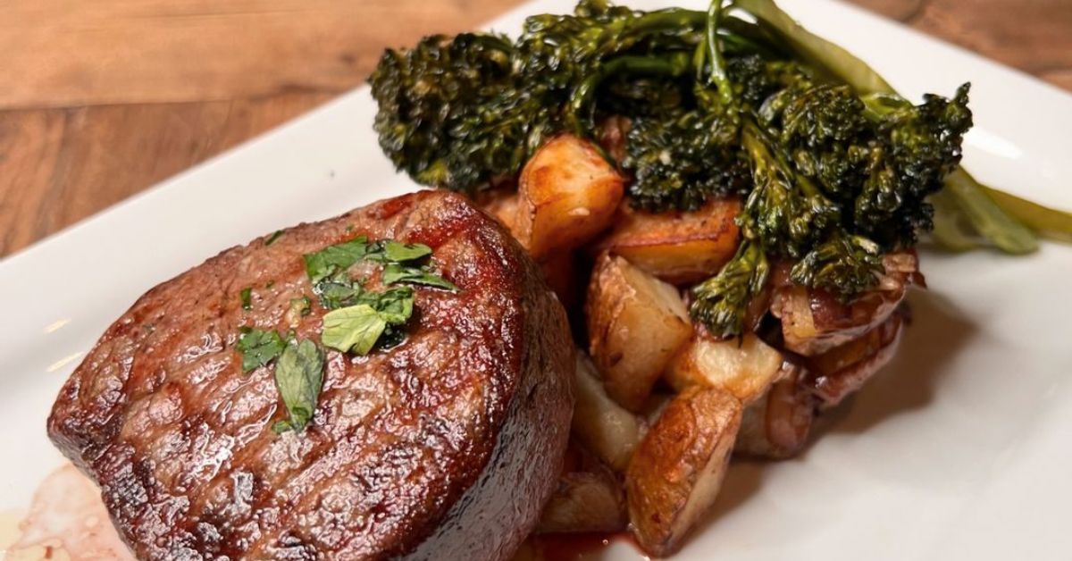 steak, potatoes, and greens