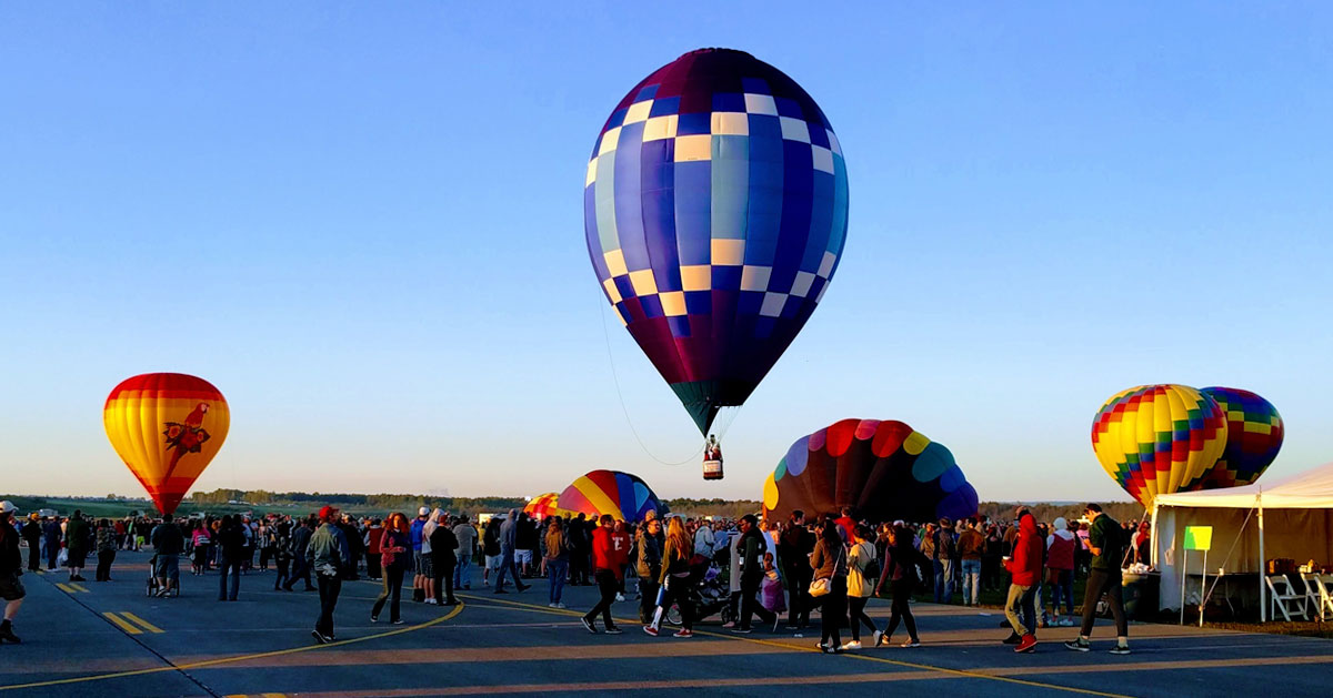 people at a balloon festival