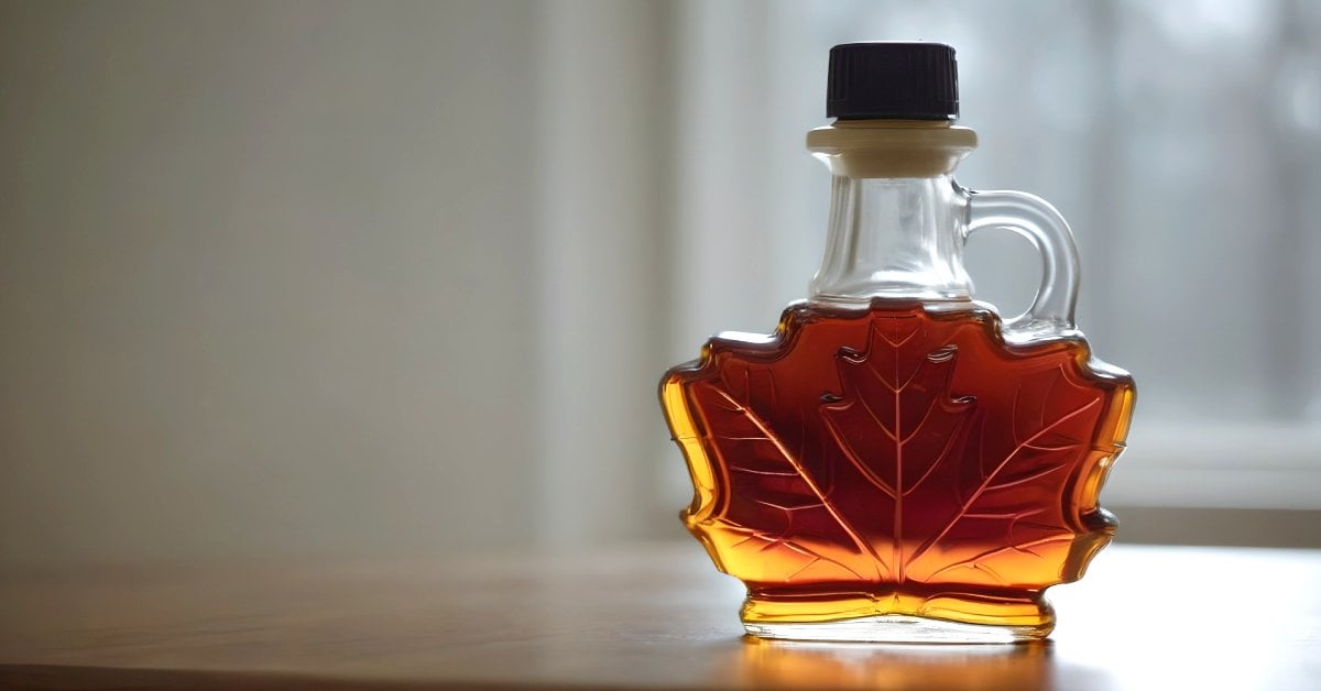 a leaf shaped bottle of maple syrup
