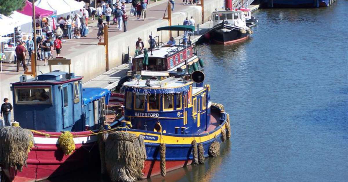 canal boats and a nearby festival