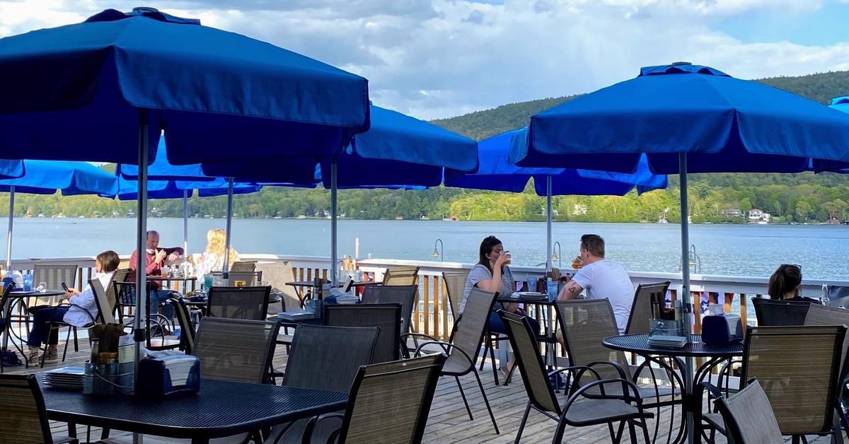 people patio dining at lake george beach club