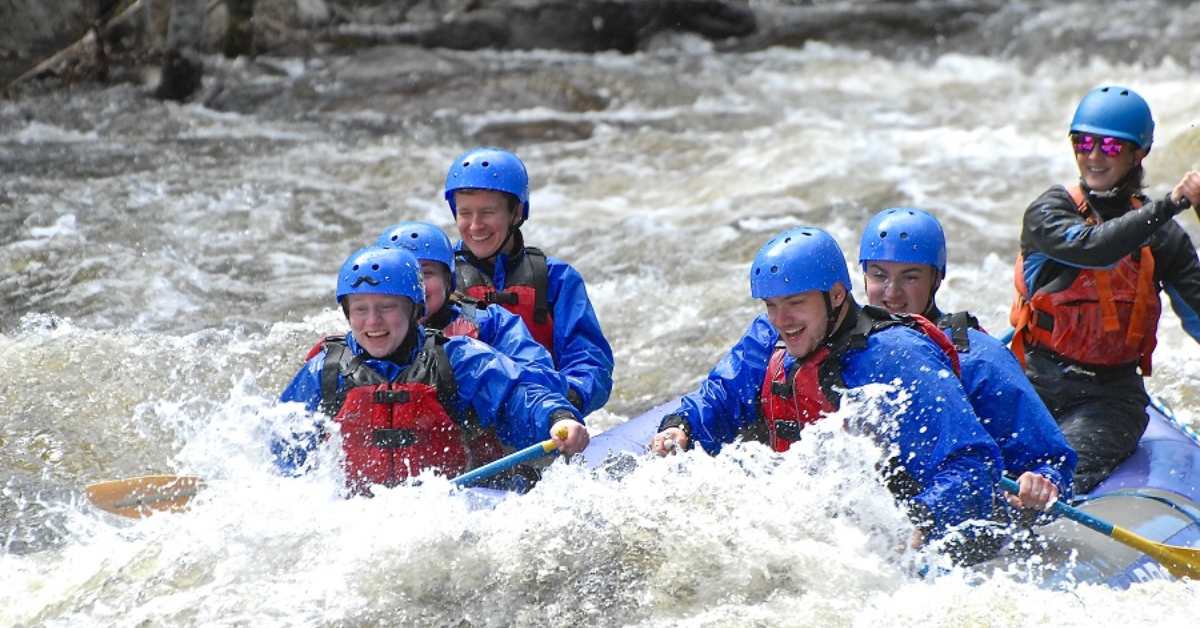 six people whitewater rafting