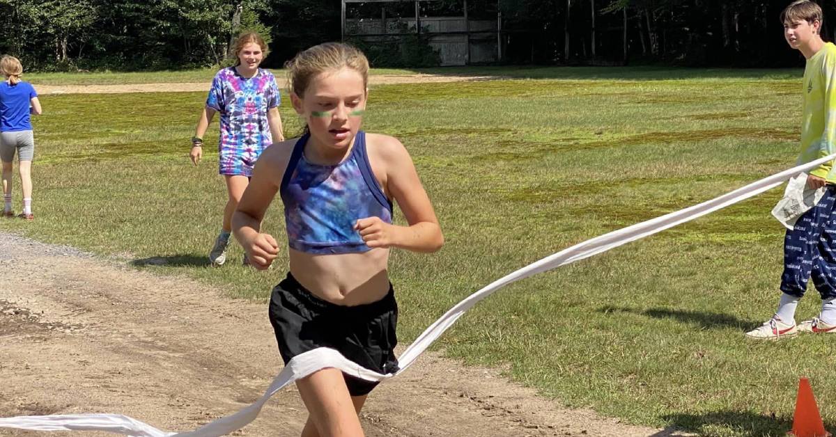 camp girl runs a race