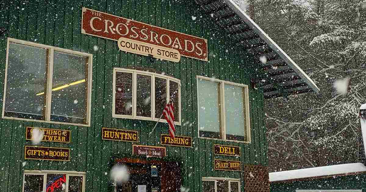 Green country store building in the snow