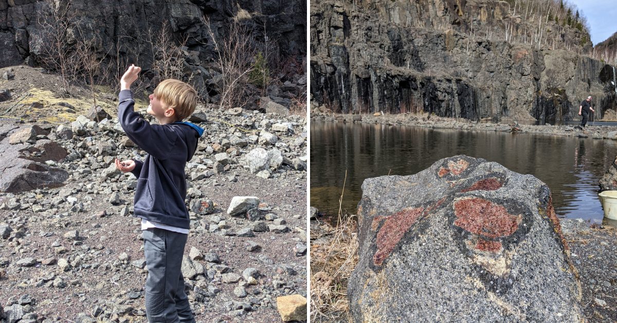 boy looking at find at gore mountain gem and mineral shop, rock by water