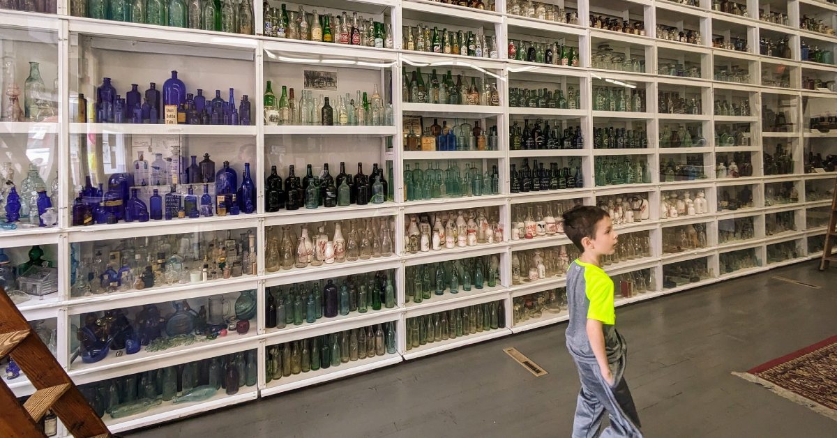 kid in national bottle museum