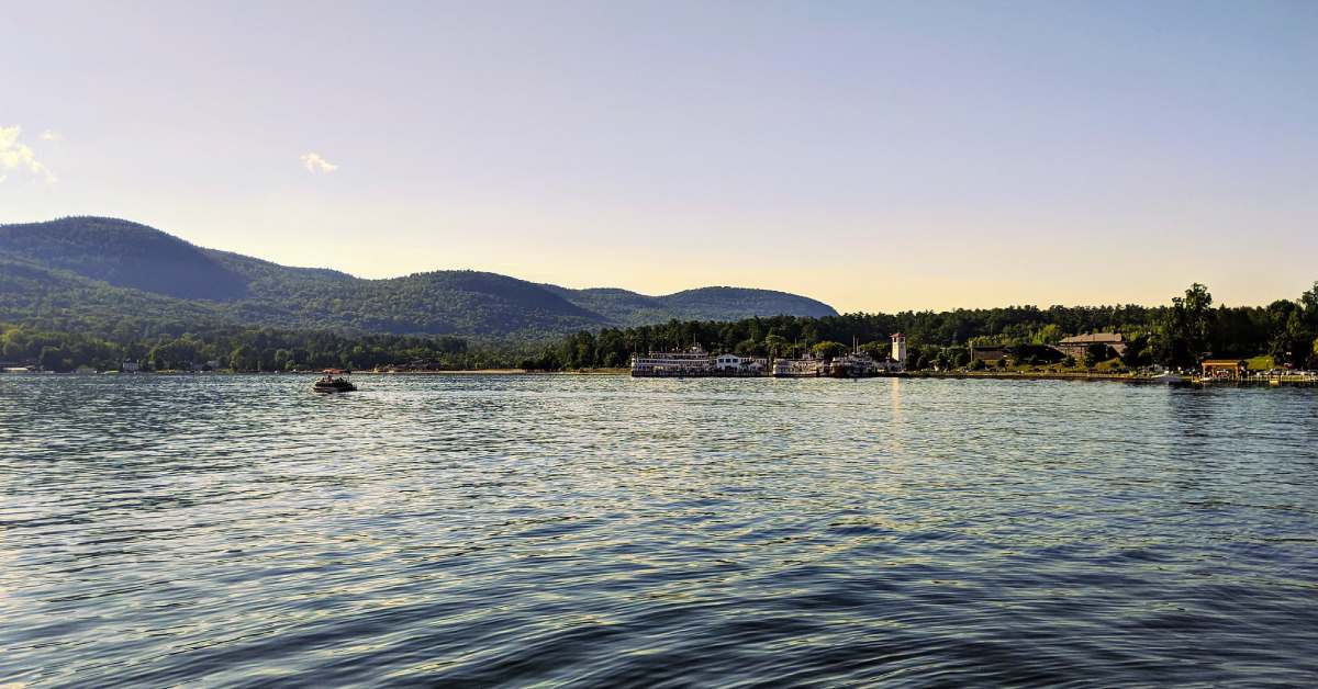 view of lake george with mountain in background