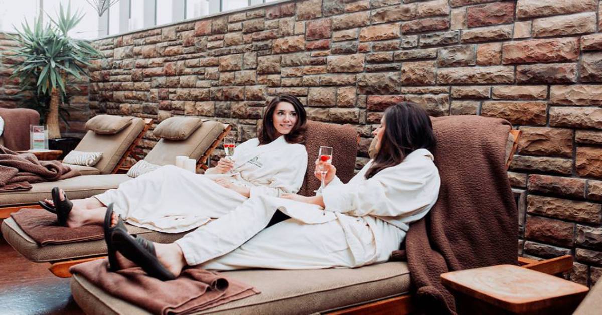 two women relaxing in a spa lounge