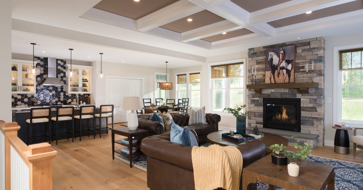 interior of home with kitchen area and fire in fireplace