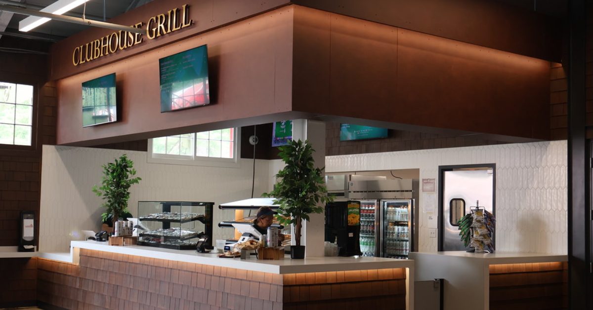 Corner shaped food counter service location labeled the Clubhouse Grill