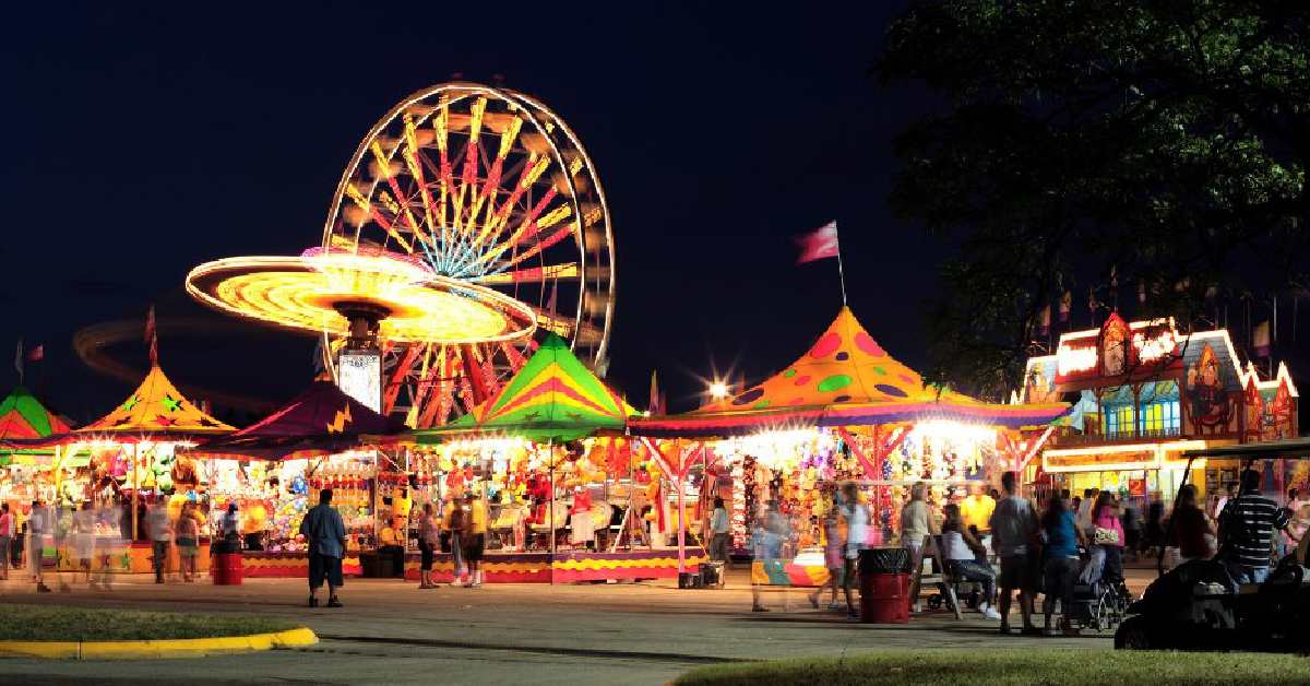 fair rides and tents at night