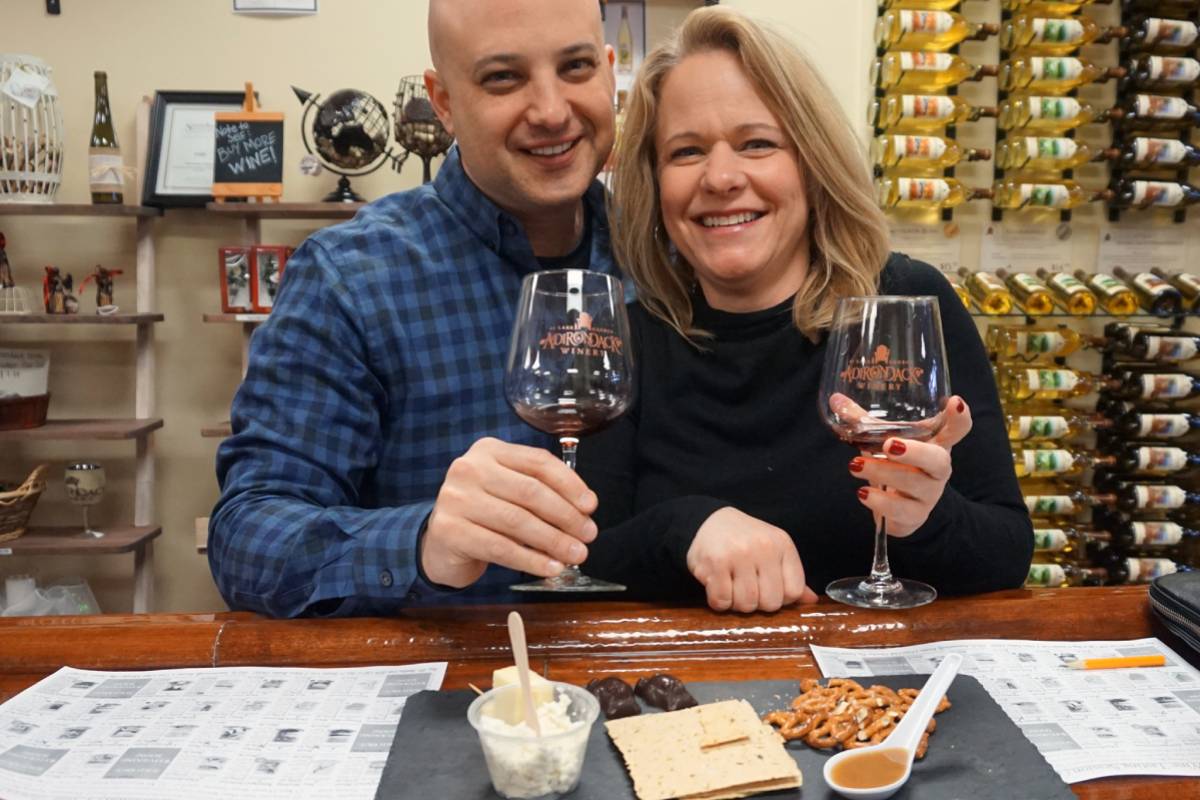 a couple enjoying a food and wine tasting