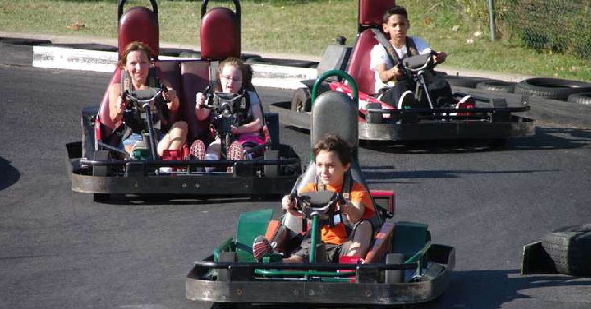 go-karting kids on an outdoor track