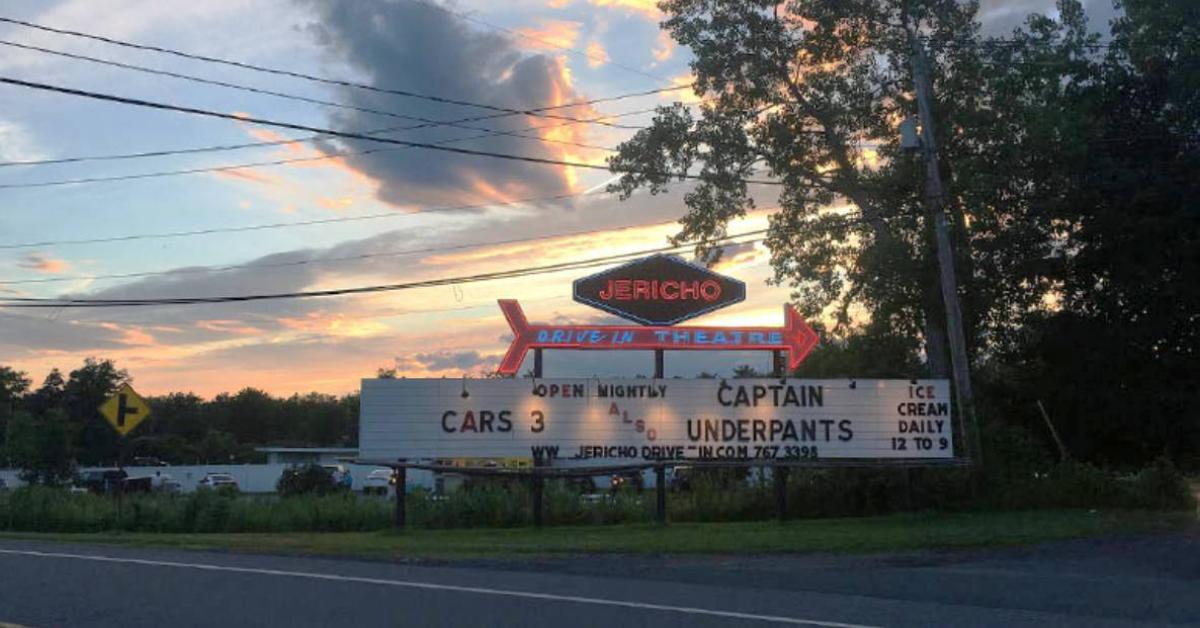 Jericho drive in movie title sign and sunset in background