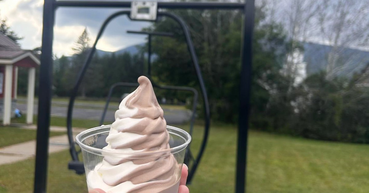 ice cream twist in a dish in front of ski lift chair