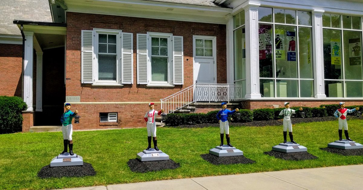 lawn jockeys outside the racing museum