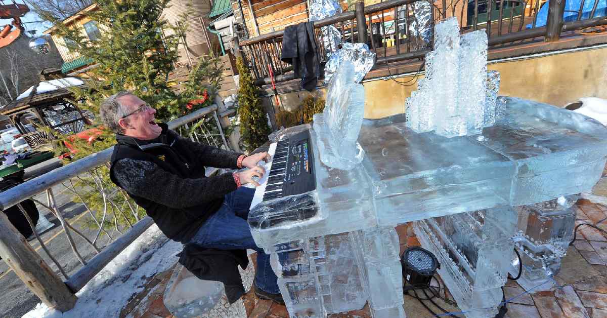 John Carr playing ice piano