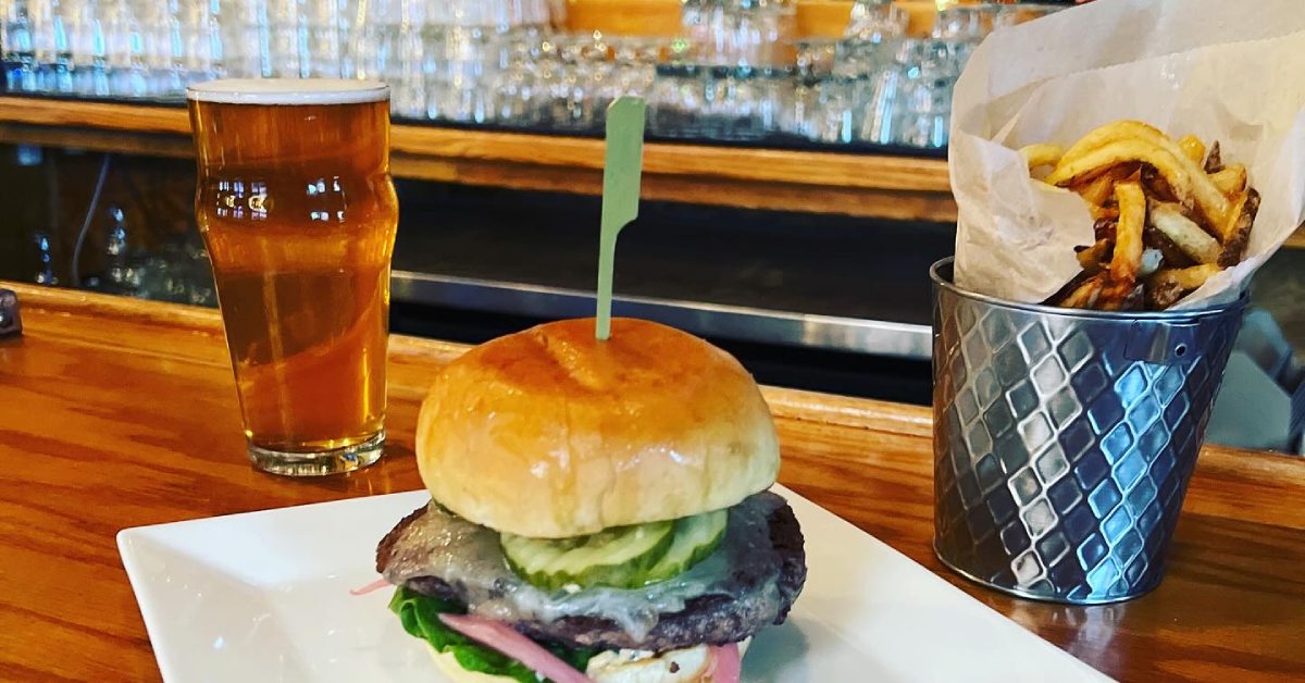 beer, burger, and french fries on bar