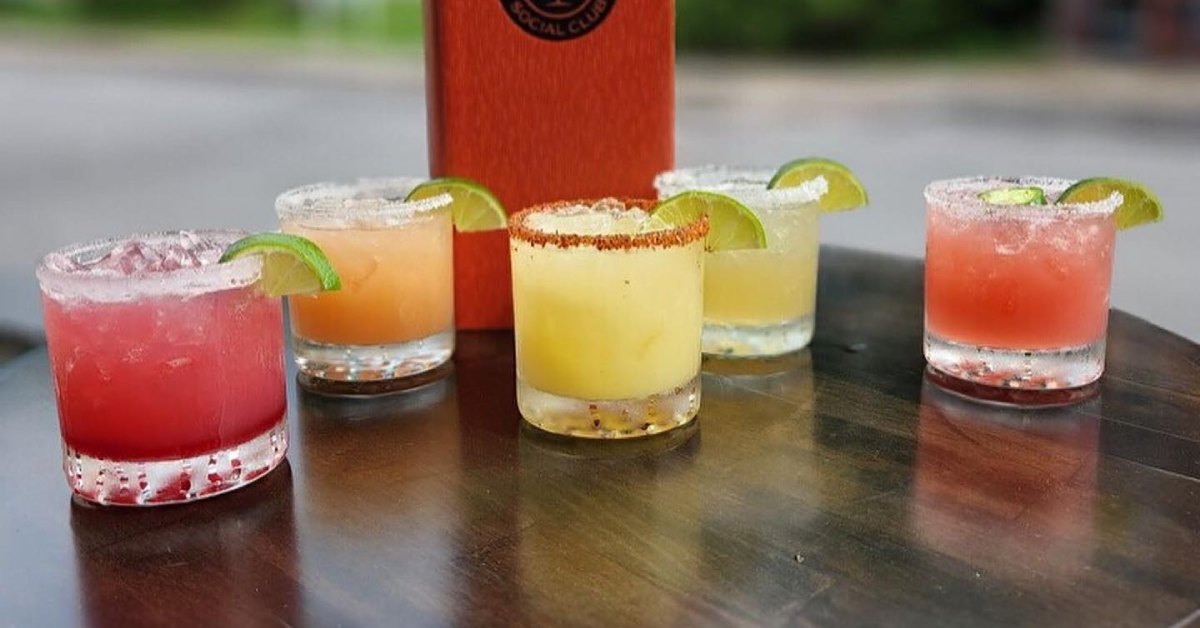 A flight of five smaller size drinks. 