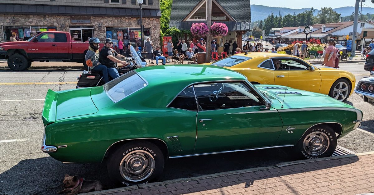 green and yellow classic cars in lake george