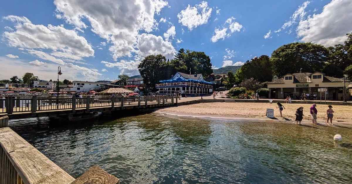 beach and shoreline with dock nearby