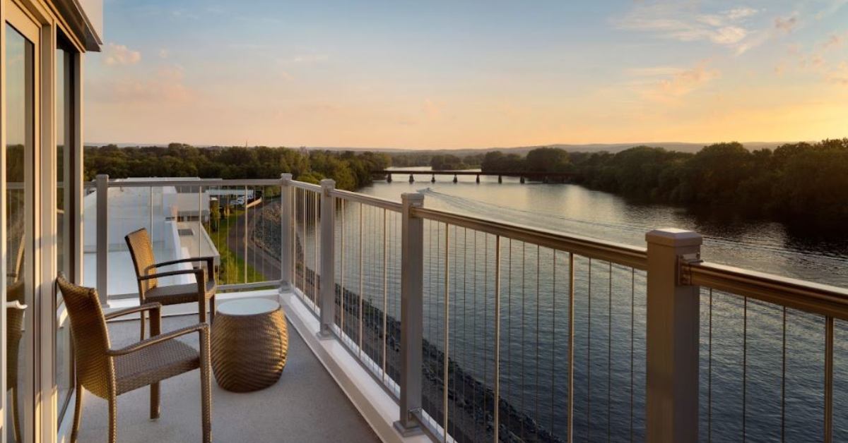 hotel room with deck facing the river