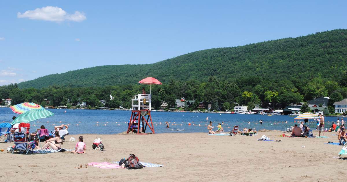 Beach with people relaxing on it