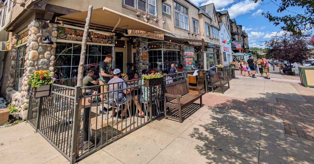 patio dining at moose tooth grill restaurant in lake george