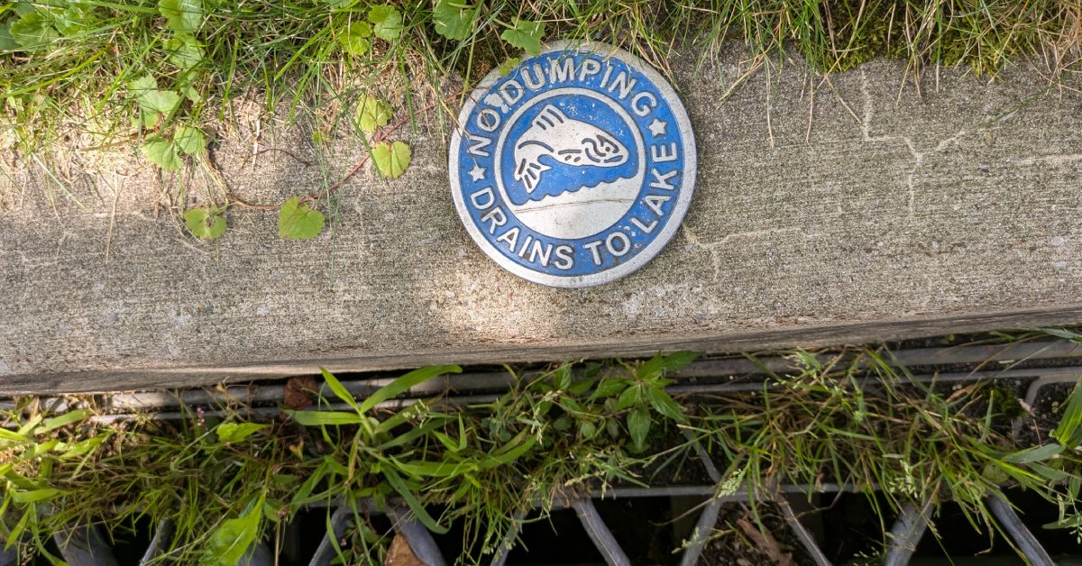 drain sign no dumping drains to lake