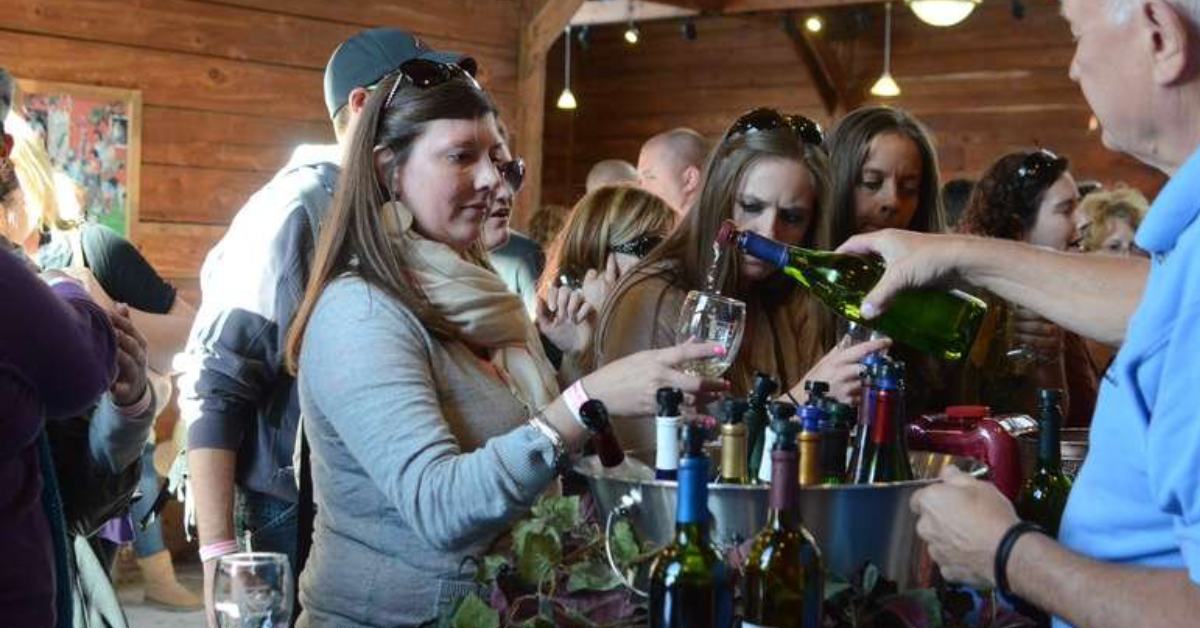 people at a wine vendor area